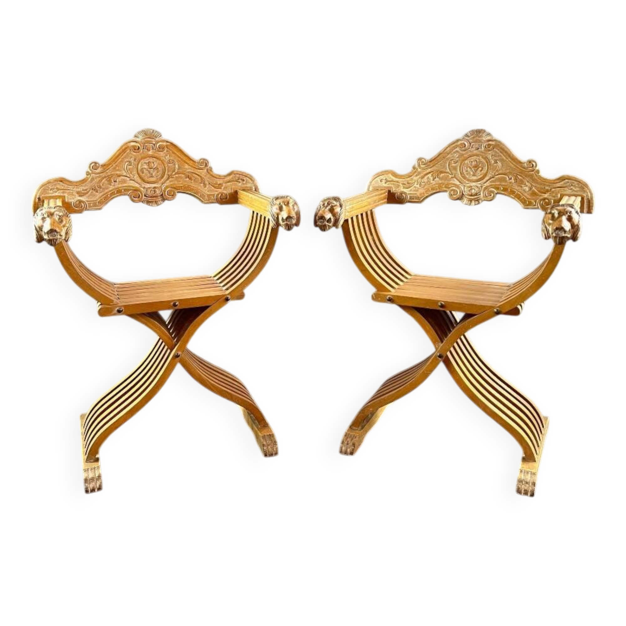Pair of Renaissance-style folding armchairs, early 20th century