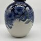 Large Tharaud Limoges vase in cobalt blue porcelain with floral decoration.