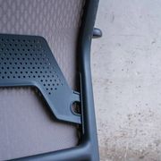 Vitra ID Trim office chair by Antonio Citterio — black mesh backrest and blue fabric seat, aluminium frame.
