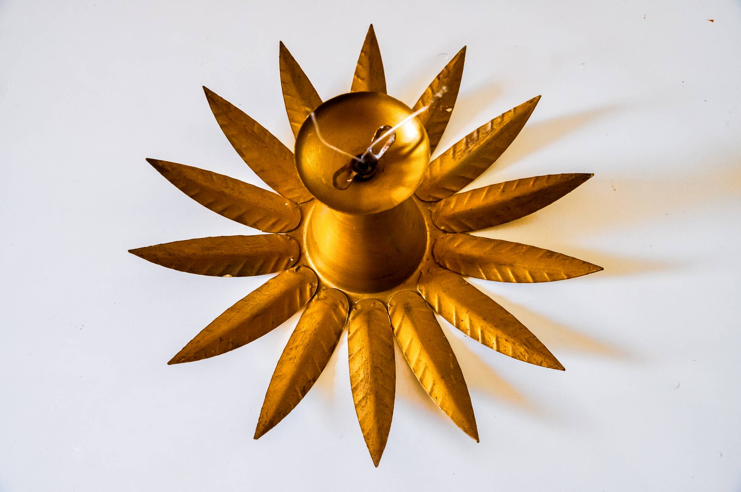 Sun wall lamp by ferro arte, metal and gold leaf, Spain, 1960