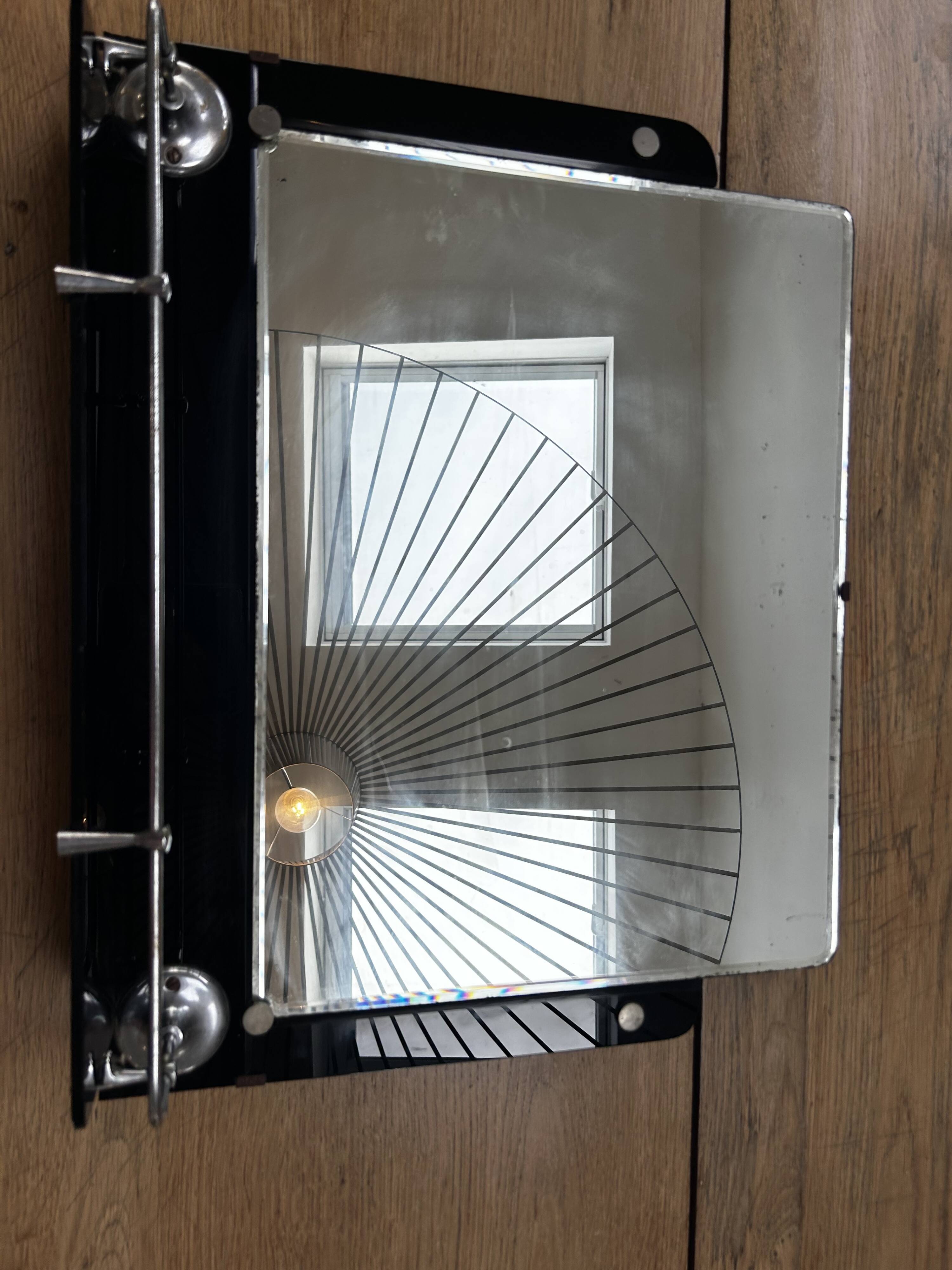 Vintage black mirror from the 1930s/40s with shelf.