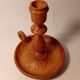 Vintage candlestick holder crafted from turned pine wood Scandinavian-style
