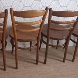 Set of 4 Baumann bistro chairs with round seats.