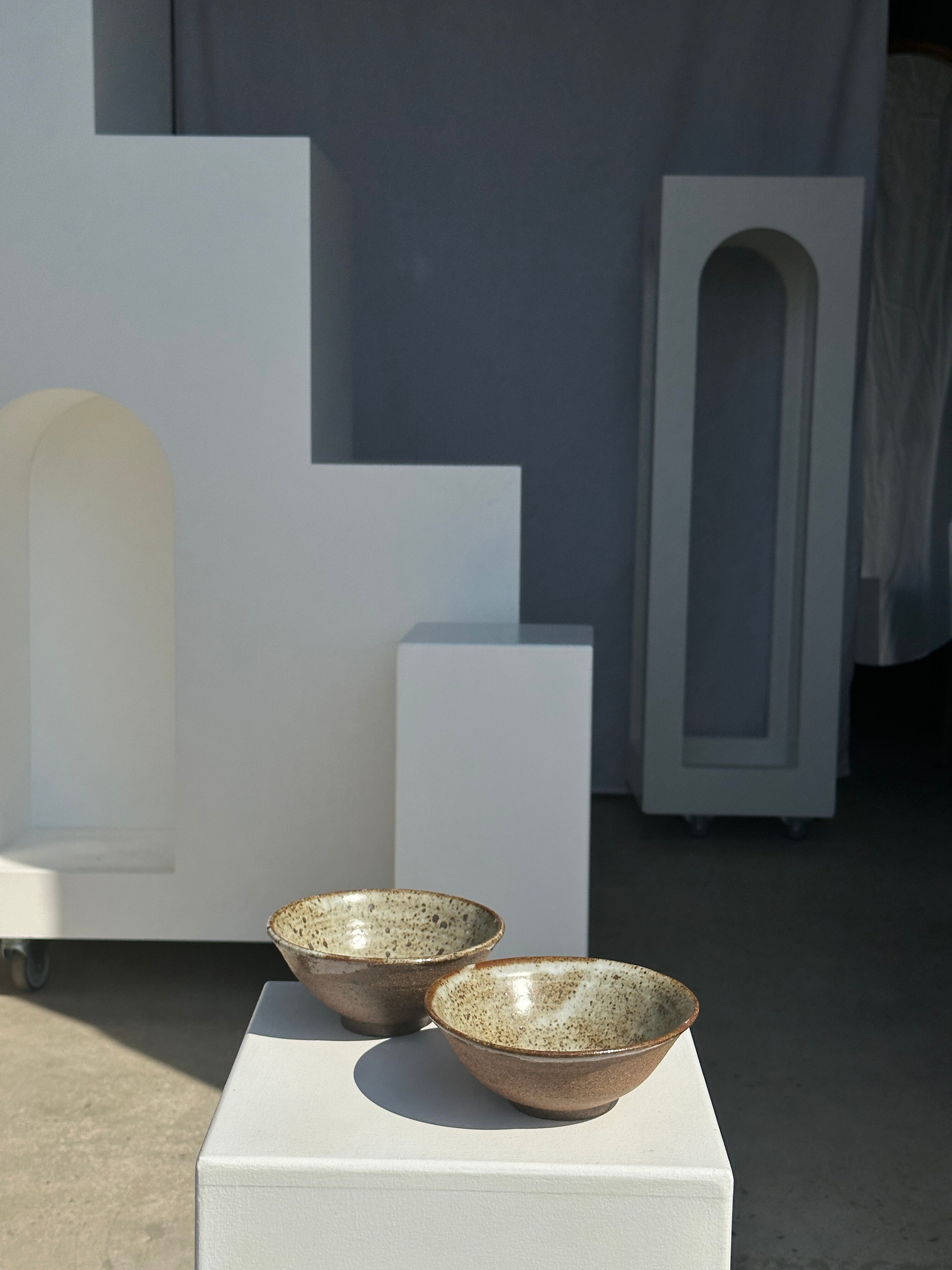 Duo of ceramic bowls interior glazed exterior matt raw earth