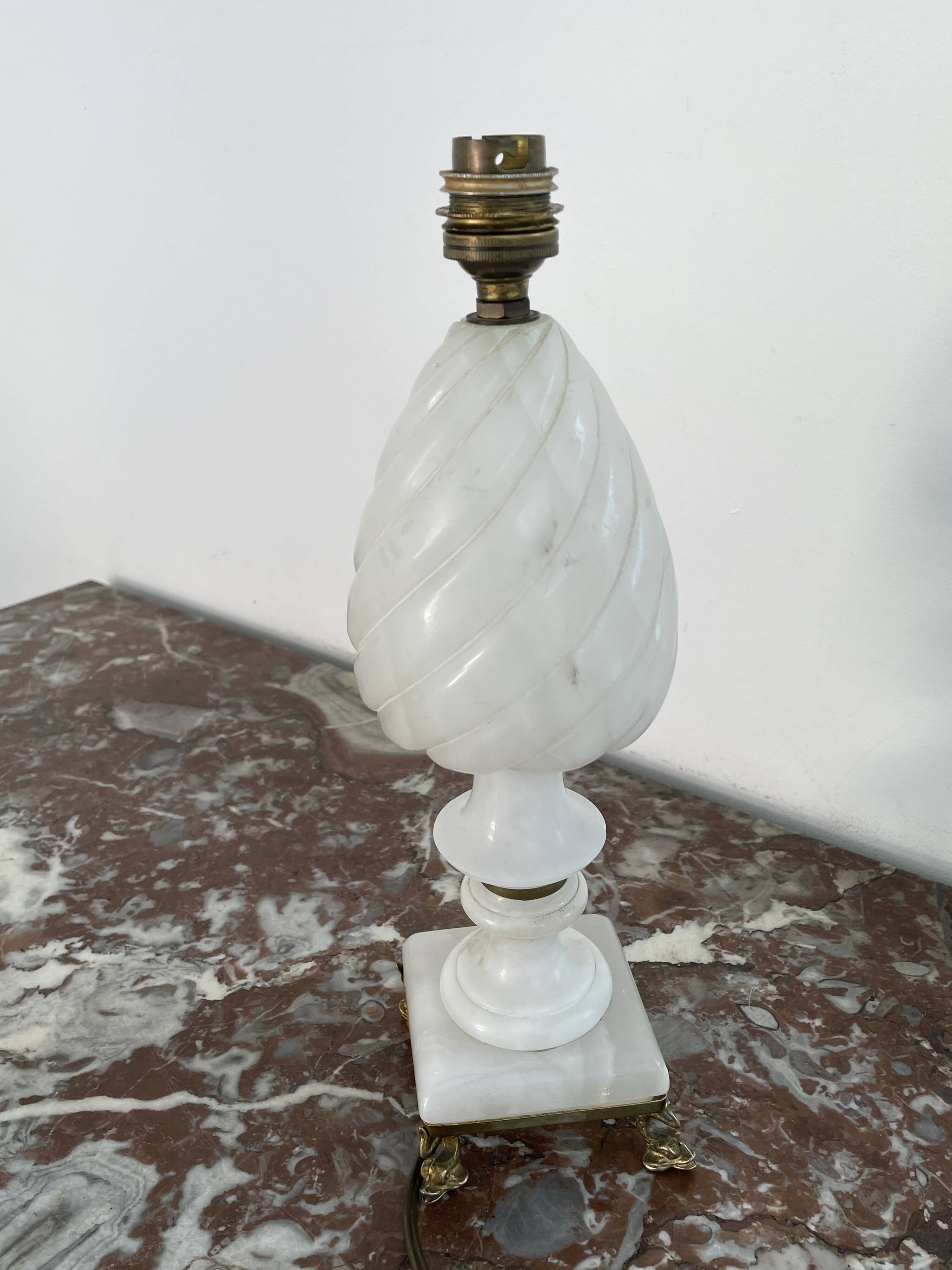 Alabaster lamp, twisted, gadroon decoration, gilded brass base, dolphins