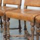 Set of 4 antique wooden and sheepskin leather dining chairs