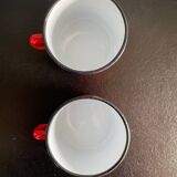 Red enameled sheet metal mug