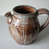 Old broc pitcher in terracotta signed and dated 87