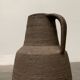 Brutalist German vase on a mid-century stand by Krösselbach Keramik, 1960s.