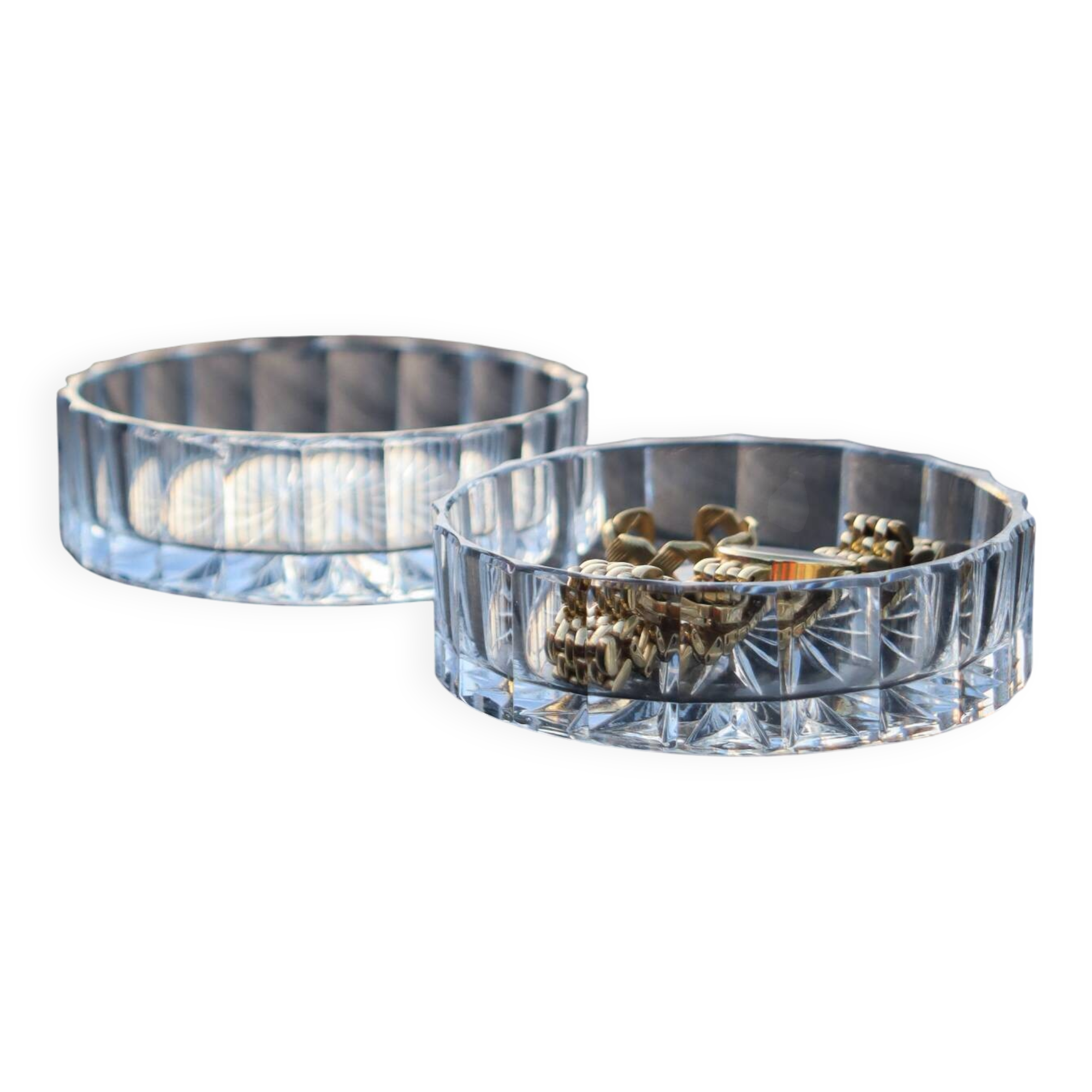 A pair of vintage cut glass catchalls.