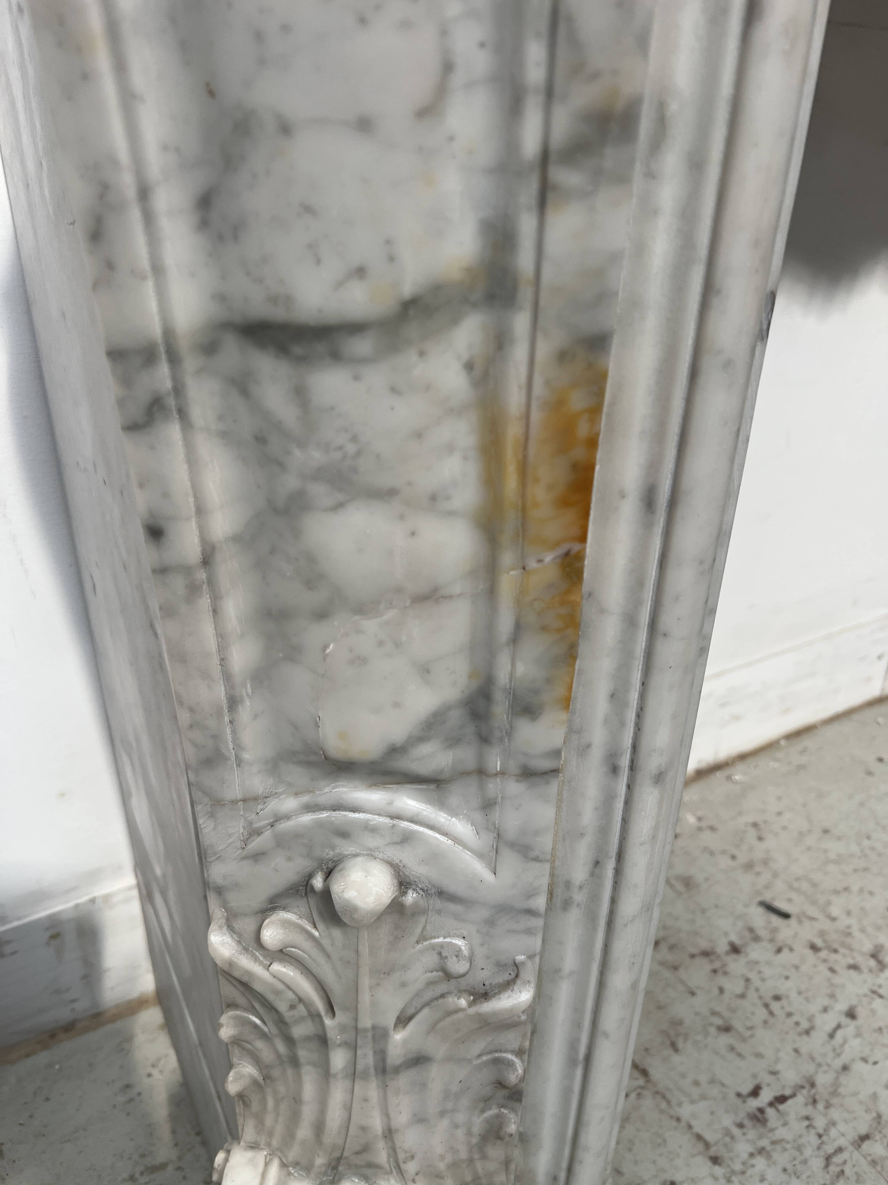 Louis XV style white Carrara marble fireplace, 19th century.