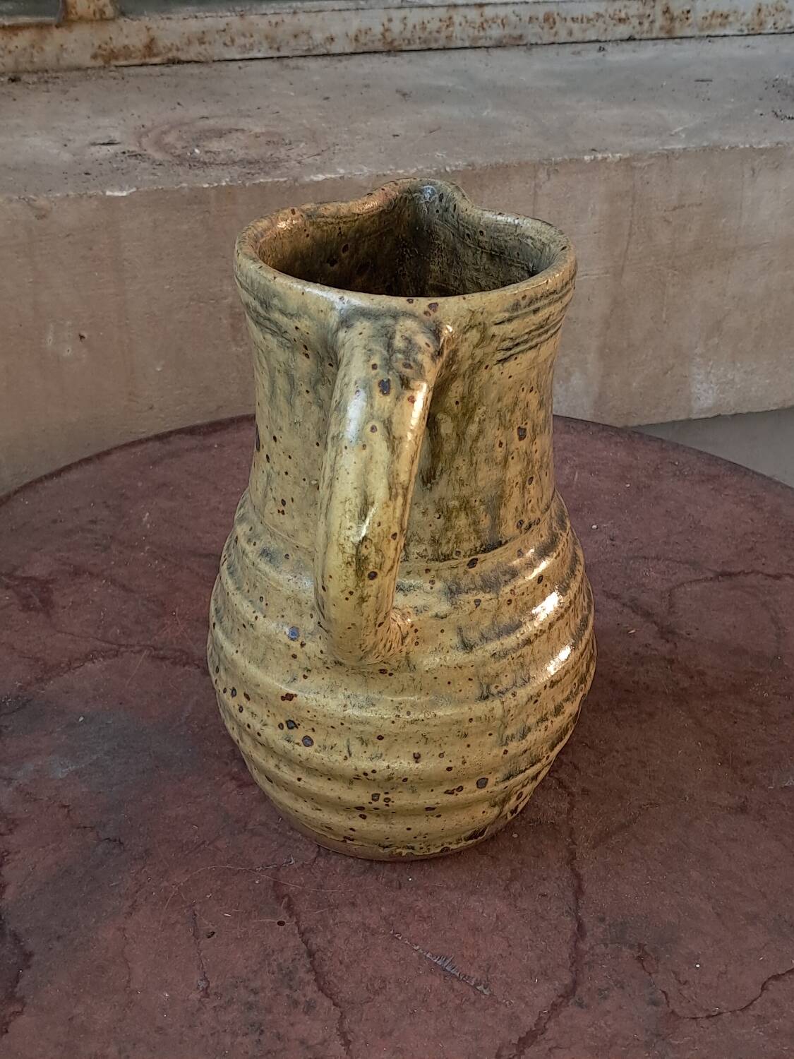 Glazed stoneware pitcher