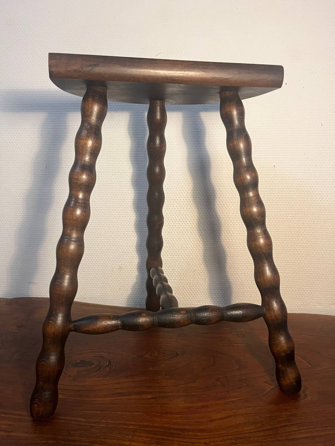 Solid wood tripod stool with turned legs