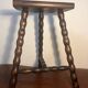 Solid wood tripod stool with turned legs