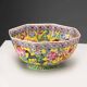 Vintage porcelain bowl decorated with dragons and flowers, China, 1980s.
