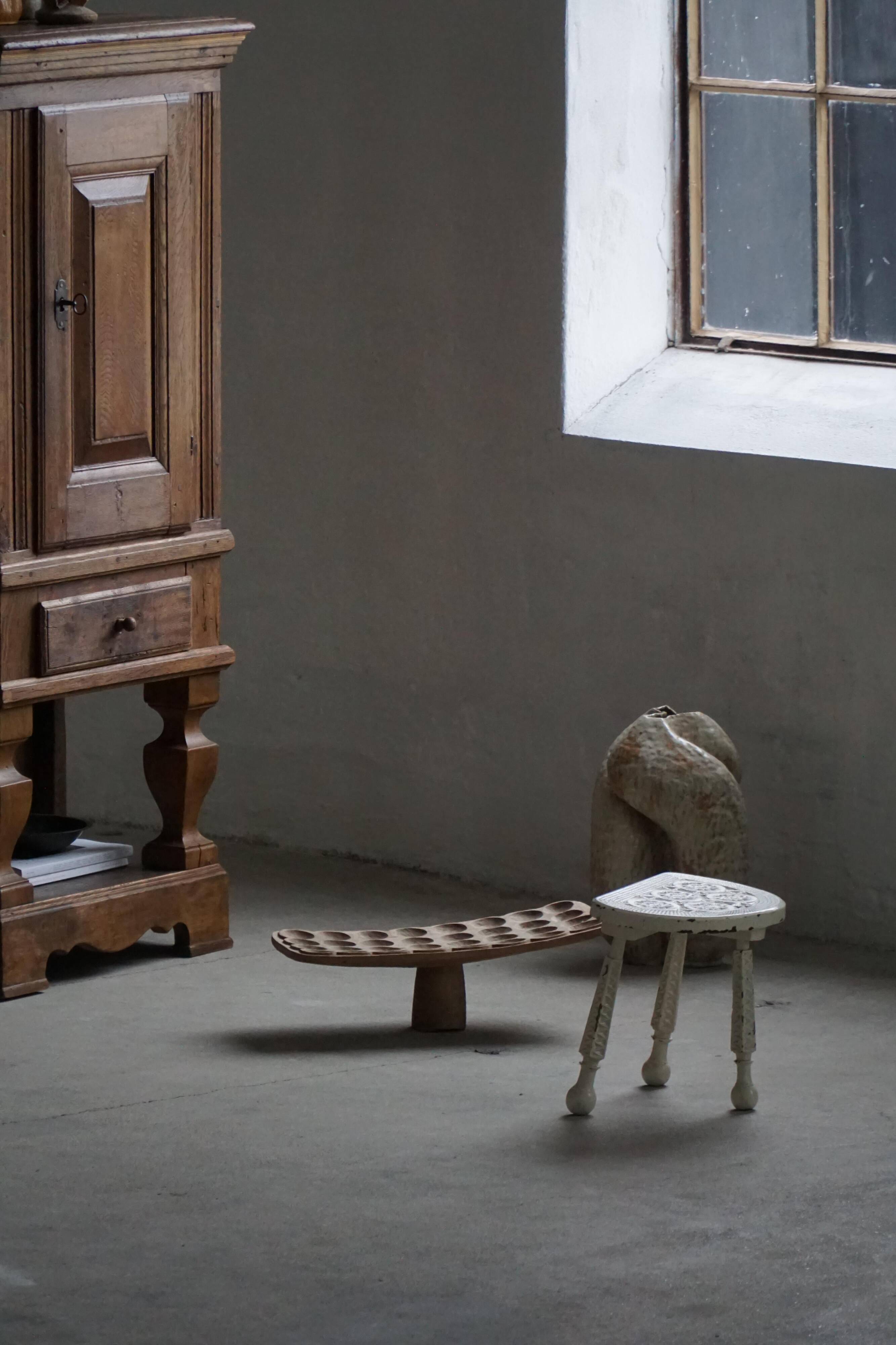 Tripod wooden stool with carved details, early 20th century Danish, 1930s.