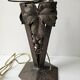Antique lamp base in wrought iron with leaf motif in Art Deco style from the 1930s.