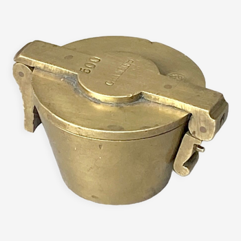 Brass bucket weight known as Charlemagne's pile