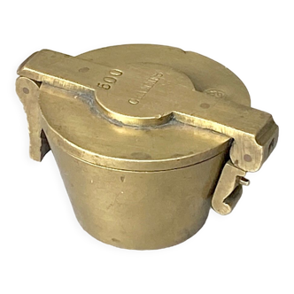 Brass bucket weight known as Charlemagne's pile