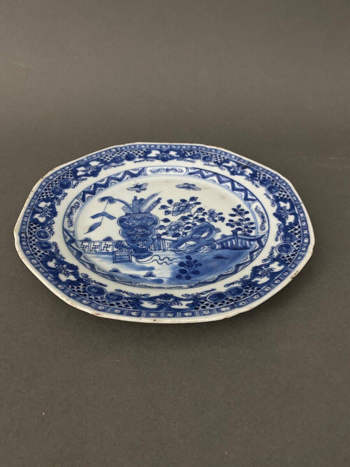 Blue and white China plate decorated with butterflies late 19th century