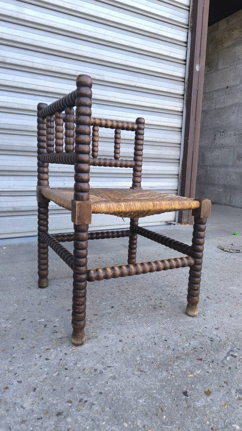 Fauteuil coin du feu en bois tourné début xx ème