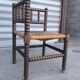 Fauteuil coin du feu en bois tourné début xx ème