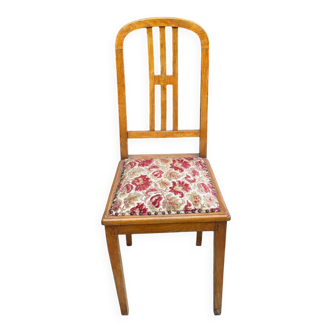Wooden chair and embroidered tapestry