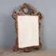 Antique carved and gilded wooden mirror, Italy, early 20th century.
