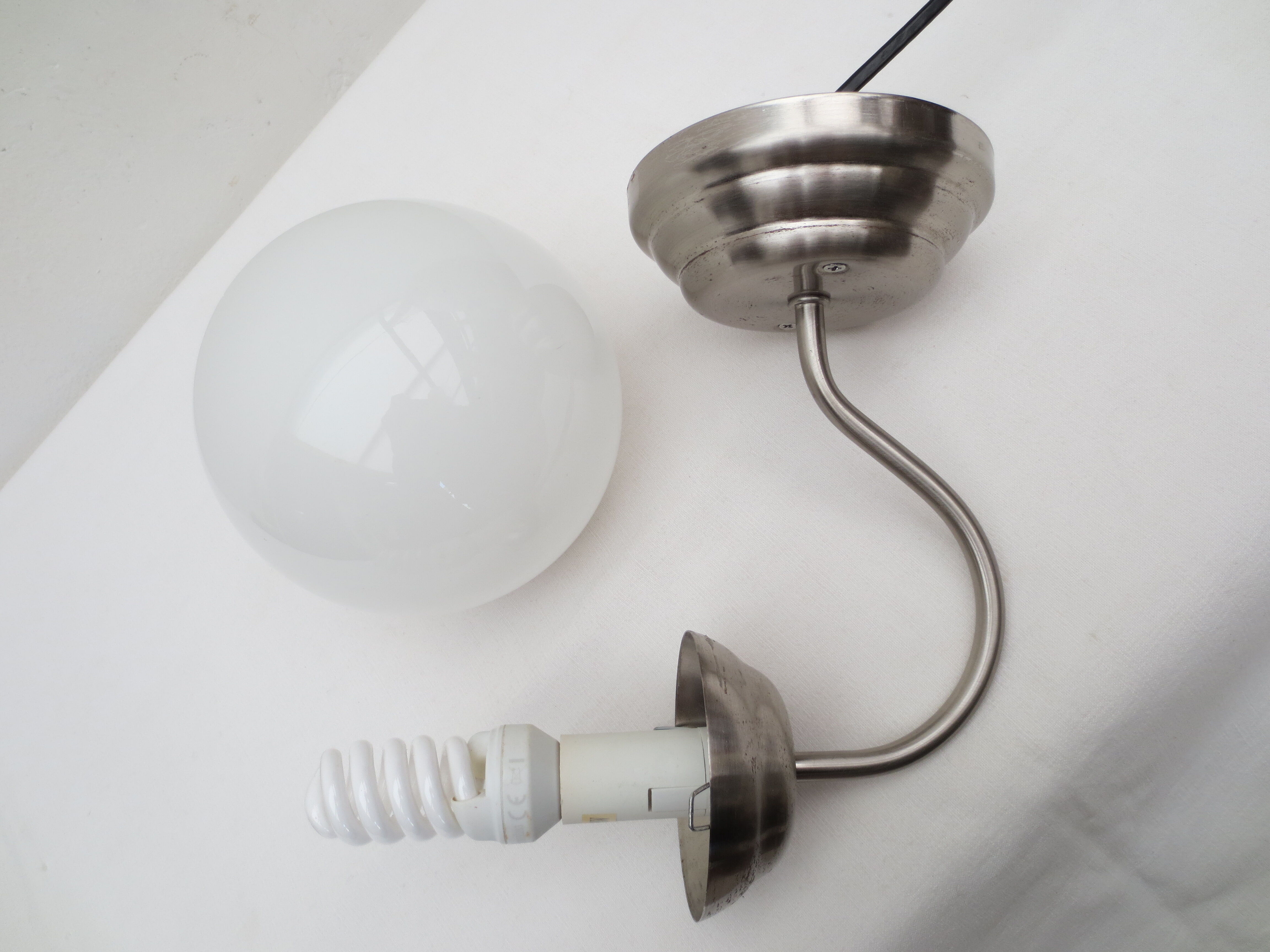 Gooseneck wall lamp, white opaline round globe