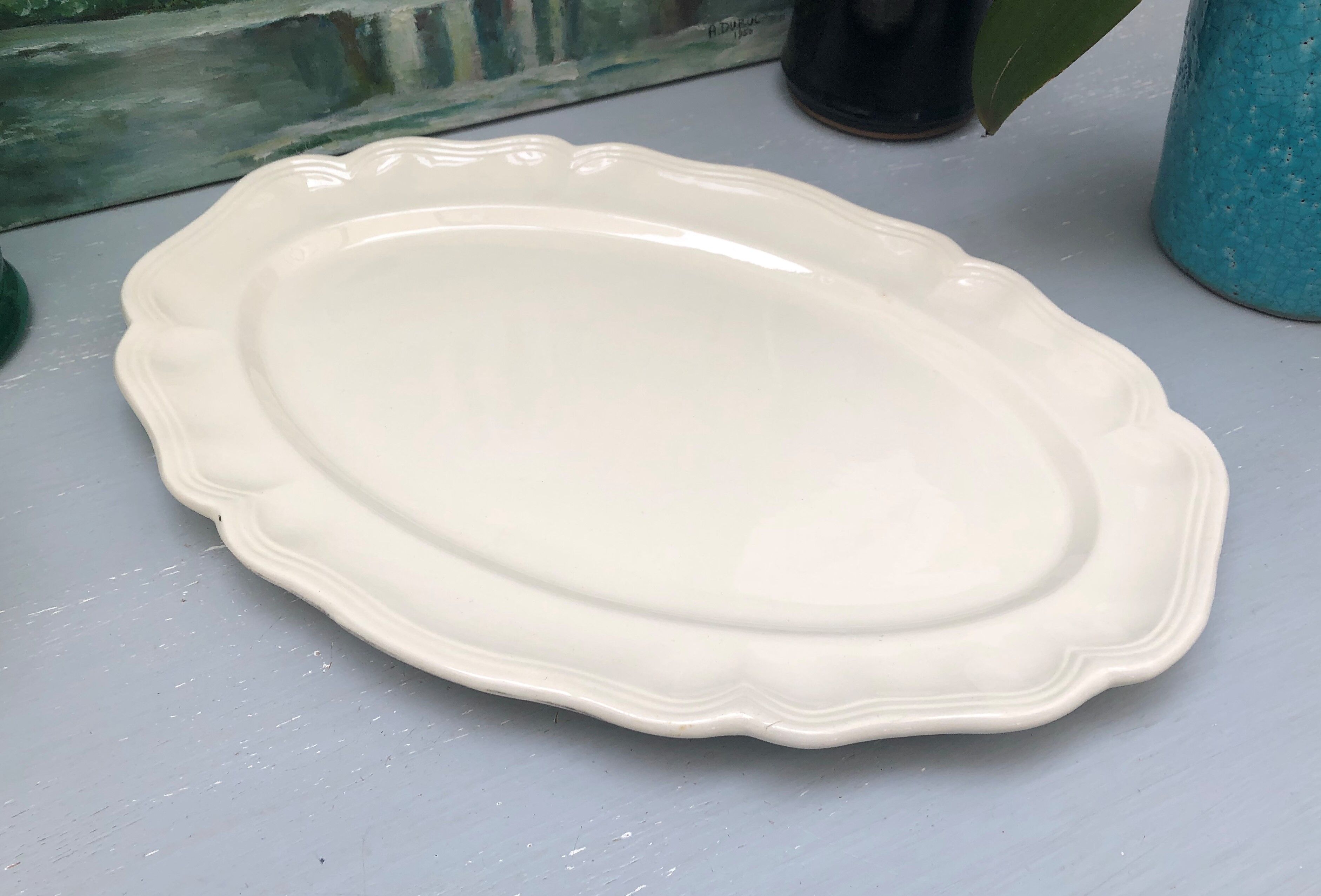 Oval ivory dish with gadroons, signed Sarreguemines France.