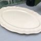 Oval ivory dish with gadroons, signed Sarreguemines France.