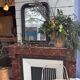Wooden fireplace mantel imitating marble