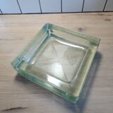 Glass block pocket emptier