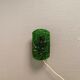 Old wall lamp made of hard pressed green glass.