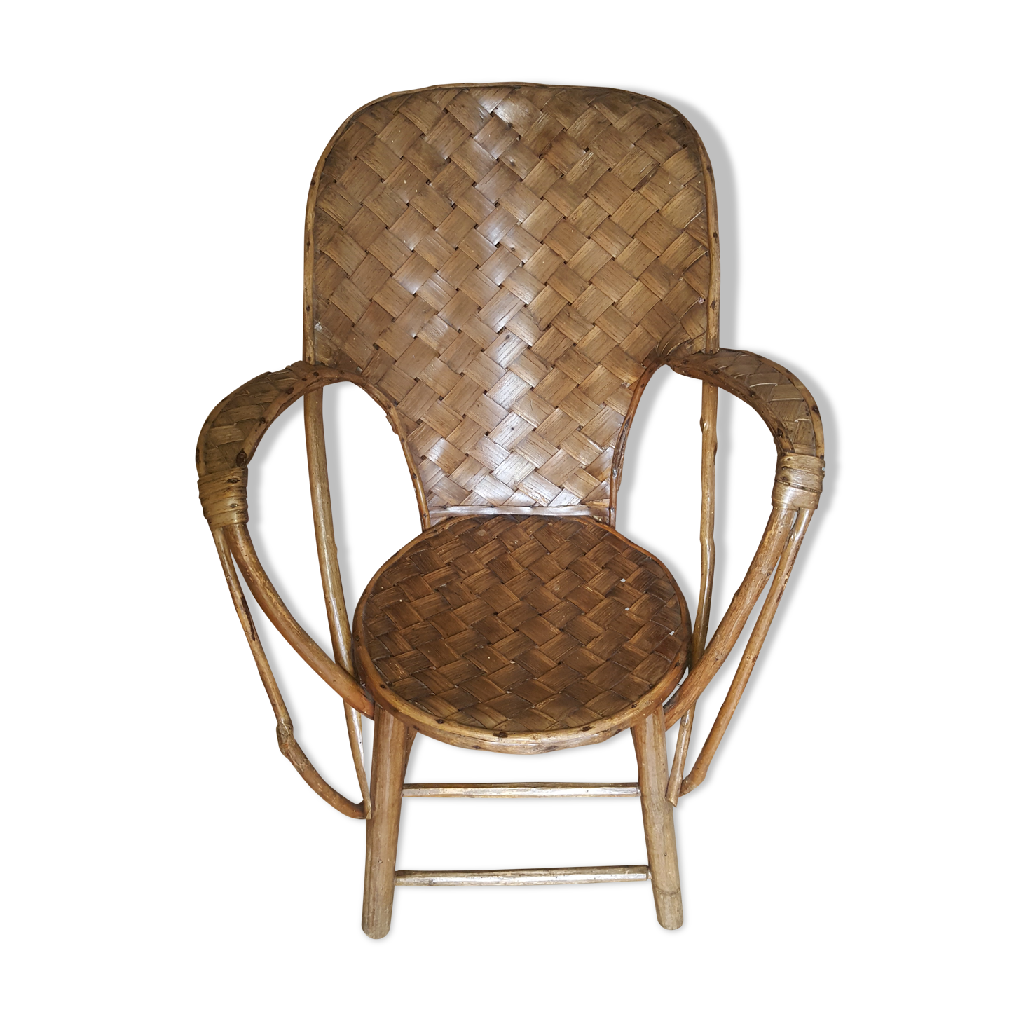 Old chair in braided chestnut
