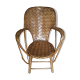 Old chair in braided chestnut