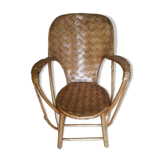 Old chair in braided chestnut