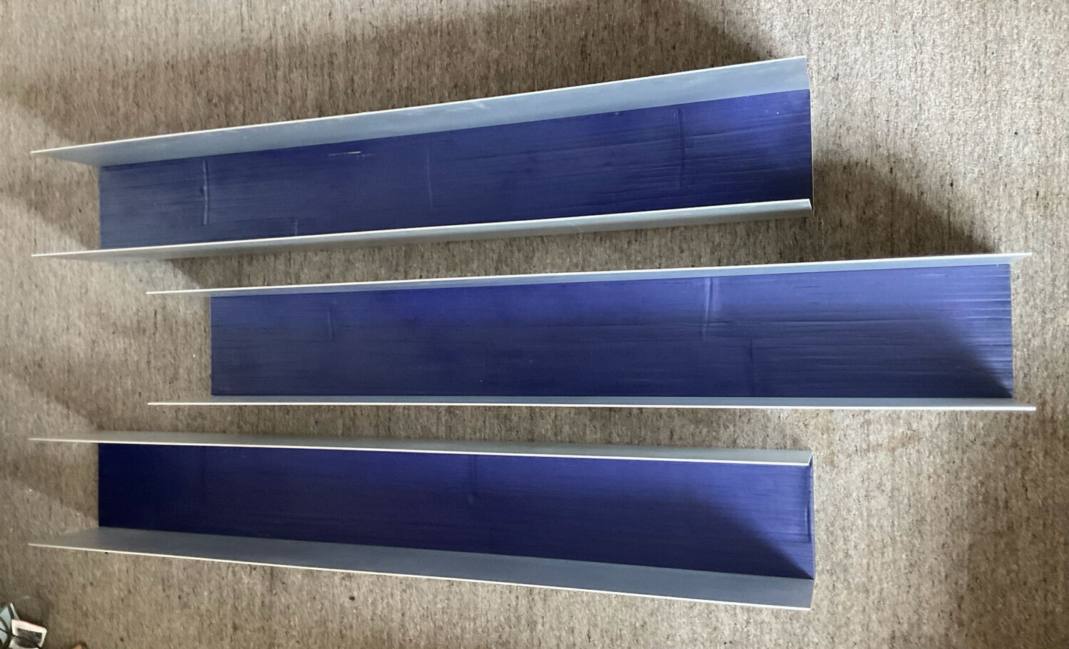 Series 3 contemporary wall-mounted bookcase shelves in aluminum and wood