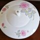 White porcelain soup tureen by Haviland with Dahlia patterns.