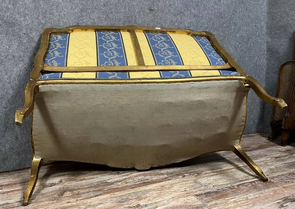 Louis XV style bench in gilded wood, 20th century