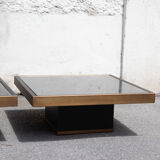 Pair of coffee tables brass black glass