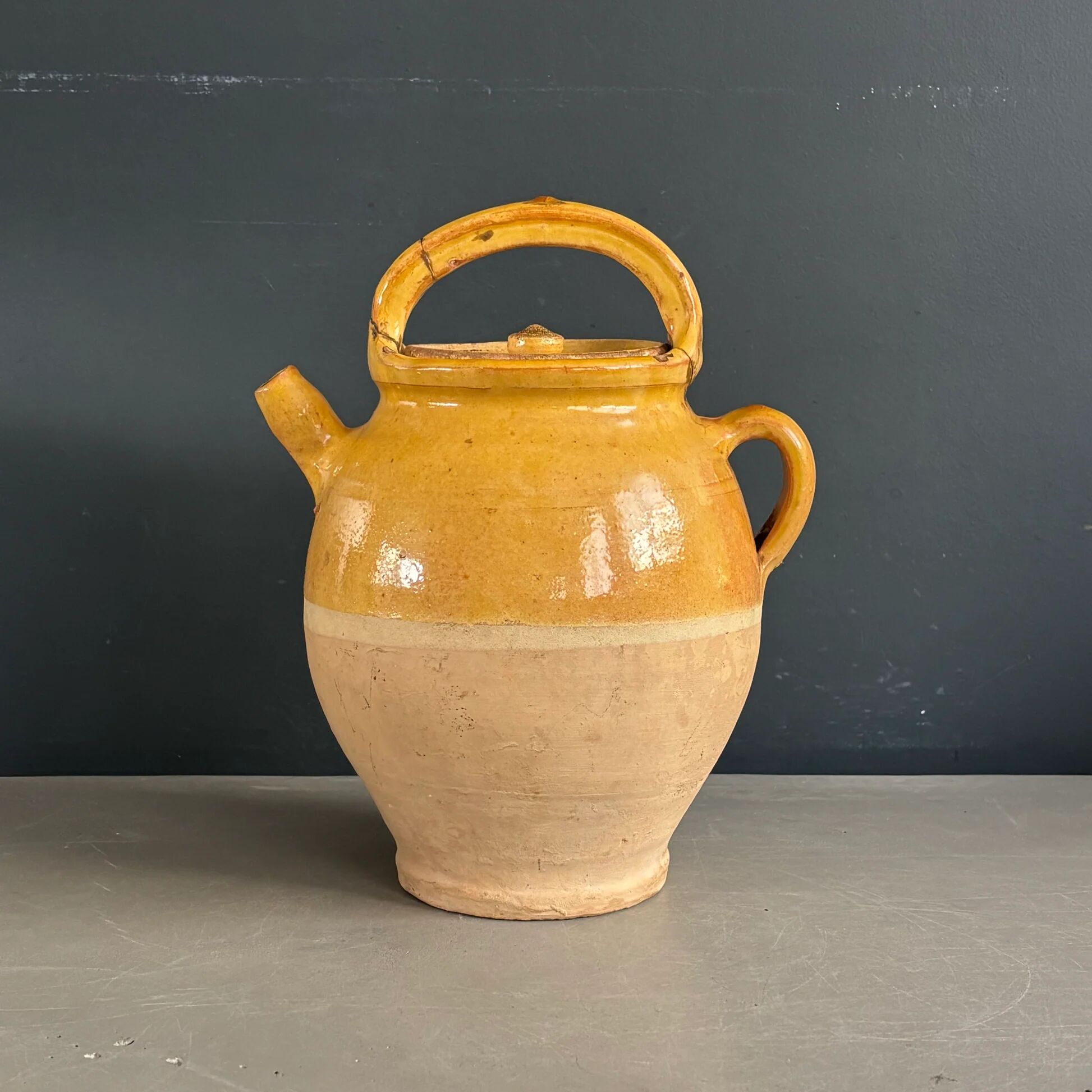 Ancient oil jar in glazed terracotta