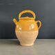 Ancient oil jar in glazed terracotta