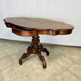 Violin-shaped pedestal table