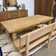 Solid oak extendable farmhouse table with 2 drawers.