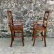 Pair of children's high chairs, early 20th century craftsmanship.