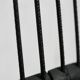 Brutalist chair, black-stained raw wood, steel. Work from the 1970s
