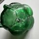 Green glass paste emptying cup from the Art Deco period