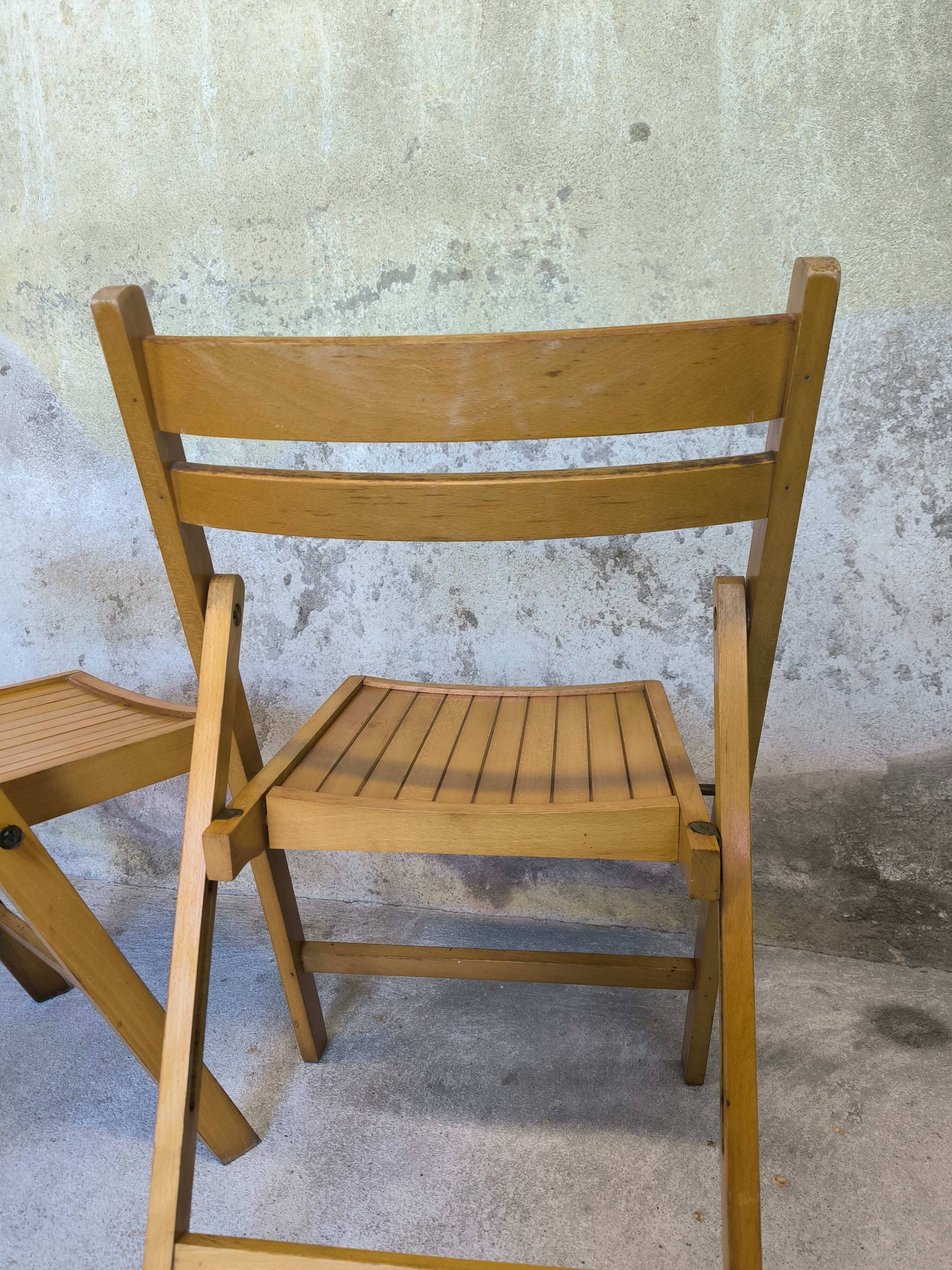 Pair of vintage folding wooden chairs