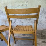 Pair of vintage folding wooden chairs